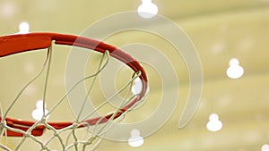 scoring basket in basketball court