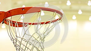 scoring basket in basketball court