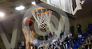 scoring the winning points at a basketball game