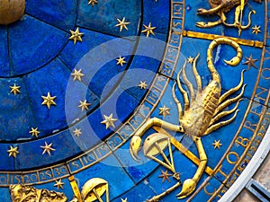 Scorpio astrological sign on ancient clock. Detail of Zodiac wheel with scorpion