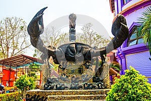 Scorpion statue at Prathat Doi Wao temple