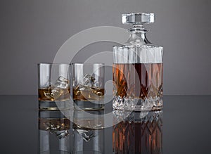 Scotch in a liquor decanter with tumblers photo