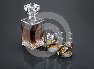 Scotch in a liquor decanter with tumblers photo