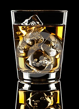 Scotch Whiskey Rocks Cocktail on Black Background