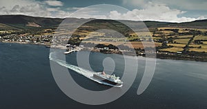 Scotland, Brodick Ferry Terminus aerial panorama shot of ship crossing, Arran Island. Scottish scape photo