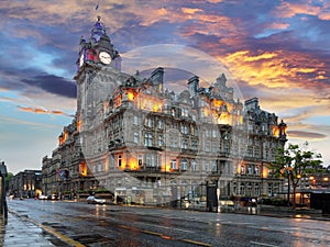 Scotland - Edinburgh at sunset on Princess street and Balmoral hotel on background