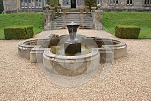 Scotney Castle fountain in Lamberhurst, Kent, England, Europe