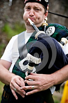 Scotsman playing Bagpipe