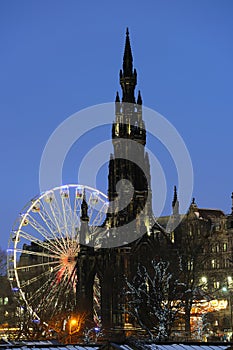 Scott Monument and big Ferris Wheel, Edinburgh photo