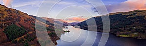 Scottish beautiful colorful sunset landscape with Loch Voil, mountains and forest at Loch Lomond & The Trossachs National Park