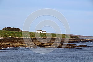 Scottish coastal landscape with house, Scotland