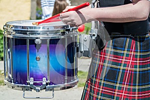 Scottish drummer in action