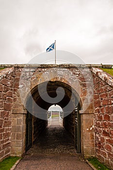 Scottish flag flying over the gate to fort george