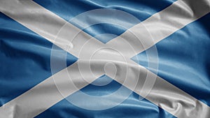 Scottish flag waving in the wind. Close up of Scotland banner blowing soft silk