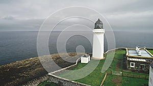 Scottish Lighthouse aerial view on seashore