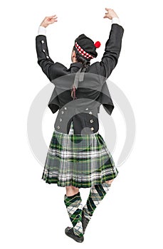 Scottish man in traditional national costume back posing