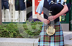 Scottish Piper on the Bagpipes