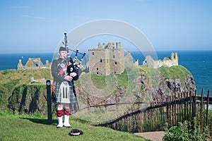 Scottish Piper at Dunnottar Castle