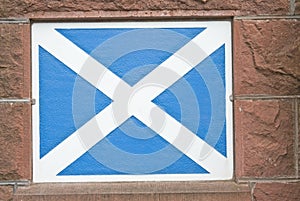 Scottish Saltire flag painted on wall.