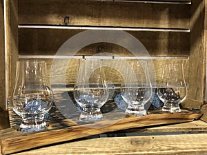 Scottish Whisky Tumblers on Oak Wood photo