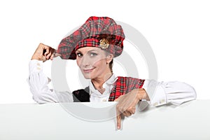 Scottish woman in traditional costume photo