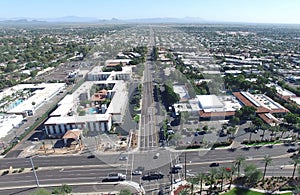Scottsdale, Arizona, USA - Aerial Shot of a Intersection near some Resorts in Scottsdale with a Blue Sky