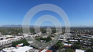 Scottsdale, Arizona, USA - Landscape Aerial shot of Scottsdale with Palm Trees, Deep Blue Sky and Mountains In the Distance