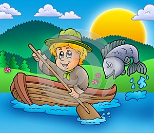 Scout boy in boat