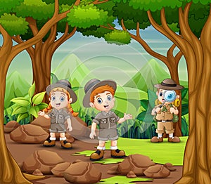 The scout kids are explore the forest
