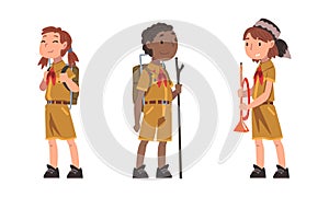 Scouting children set. Boy and girl in explorer outfit hiking with backpacks cartoon vector illustration