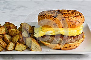 scramble egg breakfast sandwich with home fries