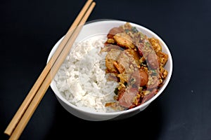 Scrambled egg with sausage, fish meatball and white rice