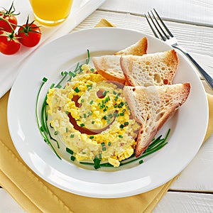 Scrambled egg with toast bread, simple breakfast