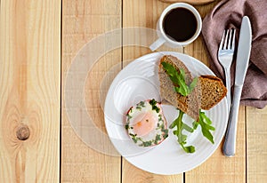 Scrambled eggs, baked in a ring bell pepper, toast, arugula