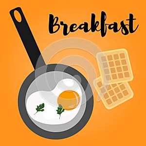 Scrambled eggs for breakfast in a pan and Belgian waffles