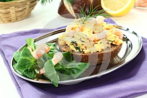 Scrambled eggs with dill and shrimp