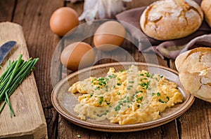 Scrambled eggs with herbs photo