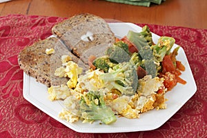 Scrambled Eggs Vegetables and Toast Breakfast