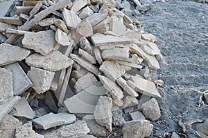 Scrap of brick from destruction building on ground