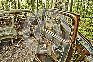 Scrap car in the woods