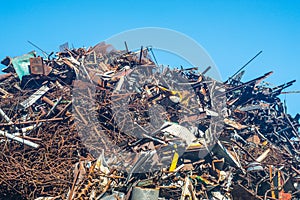 Scrap heap of steel, aluminium, corrugated plates ready for recycling