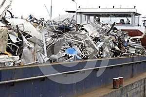 Scrap metal being transported by ship