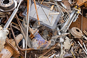 Scrap metal in railway cars.. Scrap yard, metal rubbish stock.