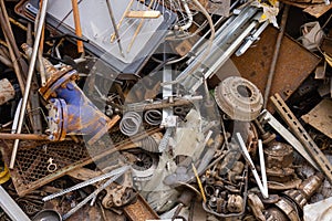 Scrap metal in railway cars.. Scrap yard, metal rubbish stock.