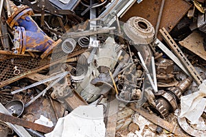 Scrap metal in railway cars.. Scrap yard, metal rubbish stock.