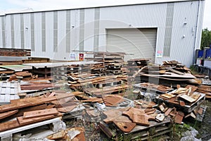 Scrap metal yard stack of steel and iron girders and plates