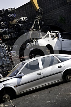 Scrap yard and crane photo