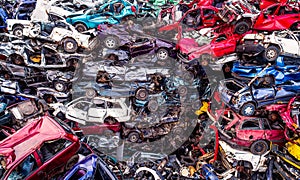 Scrapped cars stacked on a scrap yard.