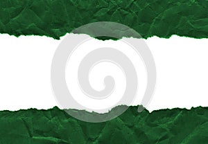 Scraps of dark green paper on a white background. Isolated on white. Ready frame for design, template.