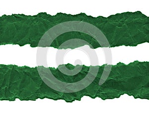 Scraps of dark green paper on a white background. Isolated on white. Ready frame for design, template.
